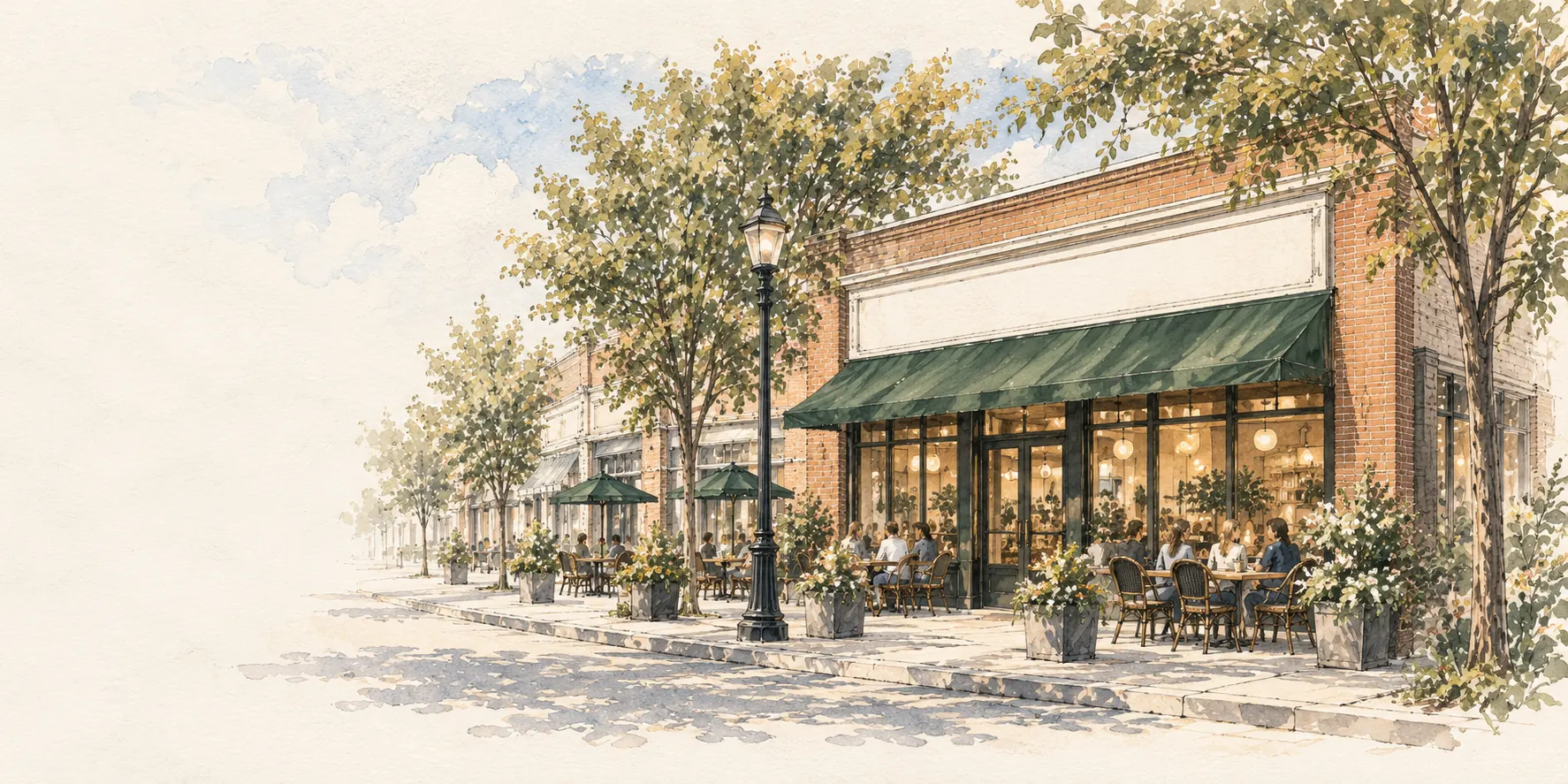 Illustration of the planned Taylors Commons storefront on Main Street: a brick building with a green awning, café tables on the sidewalk and people gathered outside.